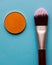 For Make-up. Bright shade with brush on a blue background