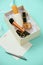 Make up gift box with serum, blush, brushes, cream and lipsticks indoors