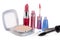 Make-up powder, lipstick, lip gloss eyeliner and mascara isolated on white background