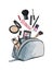 Make up products spilling out of a cosmetics bag and isolated on
