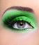 Make-up of woman eye with green eyeshadows