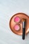 Makeup brush with blush pink and rouge color cream jars palette on stainless steel mixing plate - Make-up professional