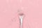 Makeup brush and shiny sparkles on pastel pink background. Festive magic makeup concept. Template for design, Top view Flat Lay