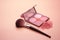 Makeup brushes with crushed eyeshadow palette on pink background - Ai Generated