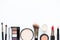 Makeup cosmetics tools background and beauty cosmetics, products and facial cosmetics package lipstick, eye shadow on the white ba