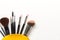 Makeup cosmetics tools background and beauty cosmetics, products and facial cosmetics package lipstick, eyeshadow on the white bac