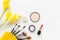 Makeup cosmetics tools and beauty cosmetics gift, products and facial cosmetics package lipstick with yellow flower on the white b