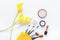Makeup cosmetics tools and beauty cosmetics gift, products and facial cosmetics package lipstick with yellow lily flower on the wh