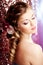 Makeup, hairstyle. Young beautiful woman with luxurious hair. Mo