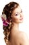 Makeup, hairstyle. Young beautiful woman with luxurious hair. Mo
