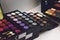 Makeup Kit for professional makeup. Bright Color eye shadow palette, set. Closeup of professional makeup kit