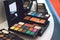 Makeup Kit for professional makeup. Bright Color eye shadow palette, set. Closeup of professional makeup kit