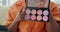 Makeup, tutorial and marketing with a black woman influencer live streaming a product review from home. Blog, beauty and