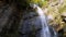 Makhuntseti Waterfall in Autumn. Falling Water Hitting on the Rocks. Slow Motion.