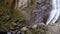 Makhuntseti Waterfall in Autumn. Falling Water Hitting on the Rocks. Slow Motion.