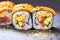 Maki Futomaki Sushi Rolls with eel, egg, unagi sauce. Sushi menu. Japanese food.