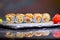 Maki Futomaki Sushi Rolls with eel, egg, unagi sauce. Sushi menu. Japanese food.