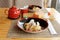 Maki rolls, fried shrimps and tea on table