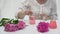 Making body care production beauty aroma perfume peonies flowers on table