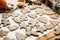 Making christmas gingerbread cookies. Raw dough in shape of gingerbread man,christmas tree, star, deer on paper and  anise,