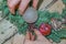 Making a Christmas wreath of twigs of blue spruce