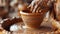 Making a clay pot with hands on potter wheel turning mud