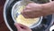 Making Cooking homemade ice cream on iced bowl.