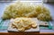 making elderflower lemonade with lemons in kitchen