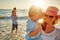 Making every moment of their family vacation count. a young family enjoying a day at the beach.