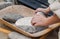 Making flour in a traditional way for the Neolithic era