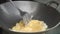 Making fried eggs in a hot frying pan