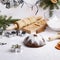 Making gingerbread cookies for Christmas Raw dough, cutters, baking ingredient