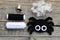 Making a Halloween felt spider decoration. Step. Cute spider ornament for Halloween decor. Craft set on a wooden table