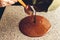 Making handmade chocolates. Confectioner pours liquid dark chocolate to the surface. Close-up. Selective focus.