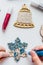 Making handmade Christmas decorations.Kids making decor for Christmas tree or gifts. Christmas handmade diy project.Zero