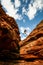 Making a jump for it at the impressive King`s Canyon, Northern Territory, Australia