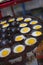 Making mini fried egg, quail egg