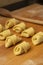 Making mini homemade croissants rolls, pastry puf. Uncooked chocolate croissants. French pastry goods