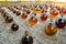 Making of natural sweet dessert muscat liqueur white wine outside in big round glass antique demijohn bottles in Frontignan, south