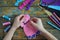 Making pink lama. Sewing toys from felt with your own hands. DIY concept for children. Handmade crafts. Step 3. Sew all details of