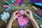 Making pink lama. Sewing toys from felt with your own hands. DIY concept for children. Handmade crafts. Step 4. Stuff the toy with