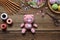 Making pink pig. Crochet toy for child. On the table threads, needles, hook, cotton yarn. Step 1 - knit all details of toy.