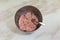 Making pork meatloaf in mixing bowl