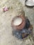 Making rice in clay pot using cow dung cake