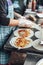 Making unfried spring roll including sauce, bean sprout, lettuce, chinese sausage and freid egg inside in in Kuala Lumnpur.