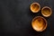 Making wooden dishes. Empty bowls on black background top view copy space