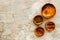 Making wooden dishes. Empty bowls on grey background top view copy space