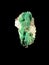 Malachite on geode in front of black background