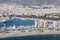 Malaga harbor with its downtown at the back seen from air.