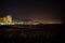 Malaga, Spain. May 4, 2018. Night view of the beach of the city of the Mediterranean Sea during a clear night. Buildings